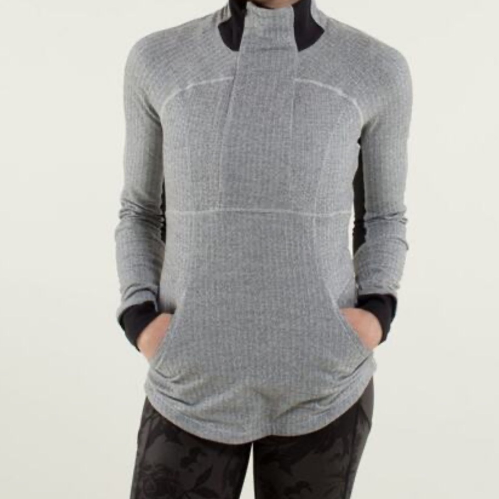 Lululemon Base Runner 1/2 Zip pullover in heathered herringbone and black.